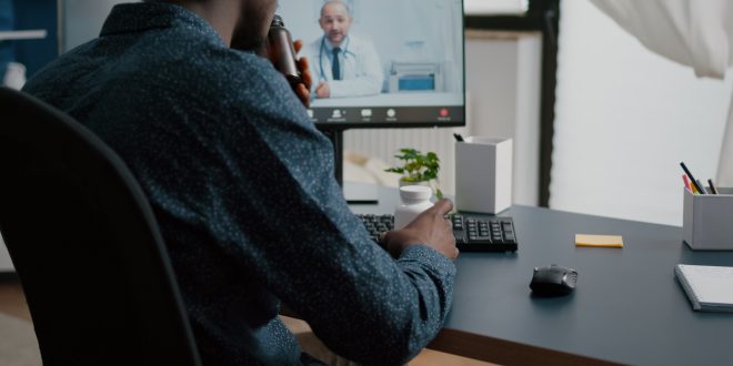 african american man seeking medical help from doctor via online intenet telehealth consultation with family medic health care checkup via video virtual conference patient seeking medicine advice 660x330 - پیش‌بینی بازار سلامت از راه دور در 5 سال آینده: فرصت‌ها و چالش‌ها